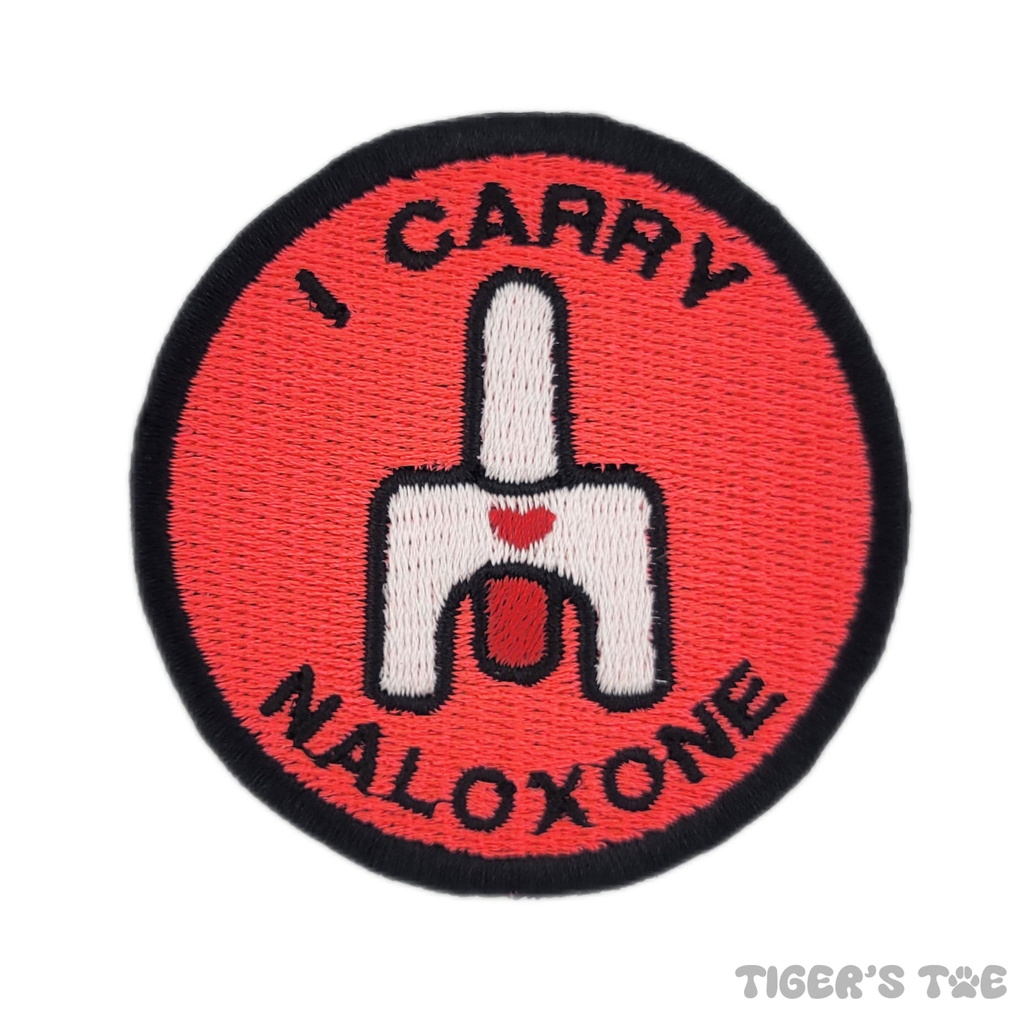 A neon pink embroidered patch with the text 'I CARRY NALOXONE' and a graphic of nasal spray.