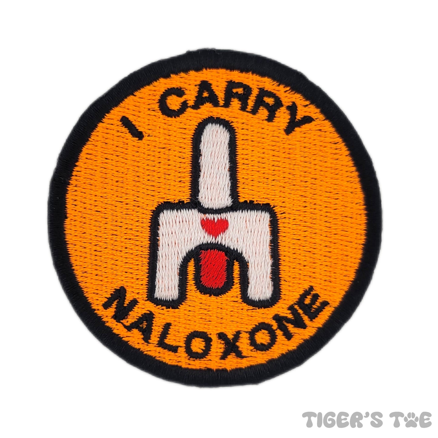 A neon orange embroidered patch with the text 'I CARRY NALOXONE' and a graphic of nasal spray.