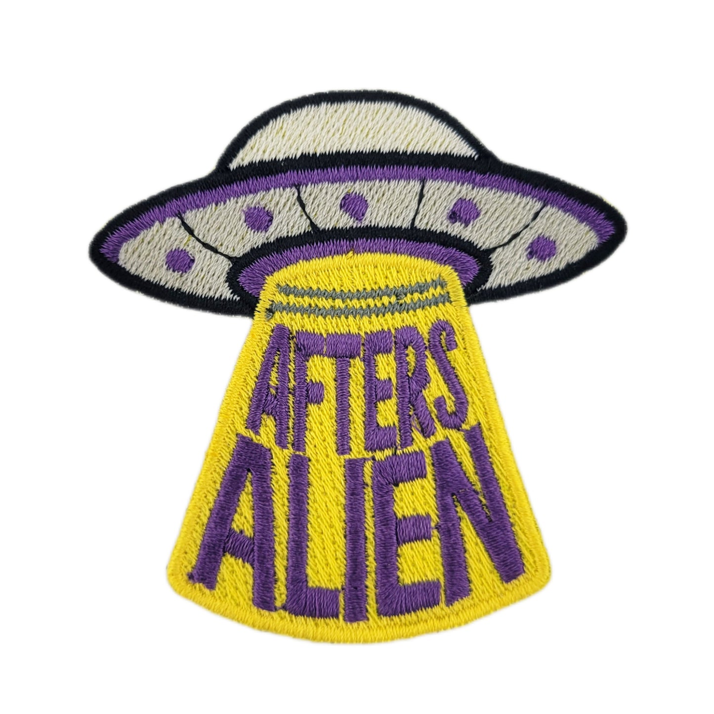 Embroidered patch with a UFO design and 'Afters Alien' text on a white background