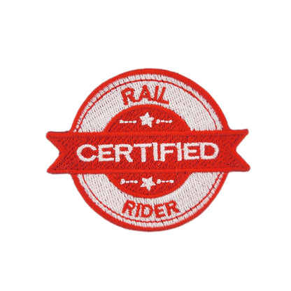 Red and white 'Certified Rail Rider' patch on a white background