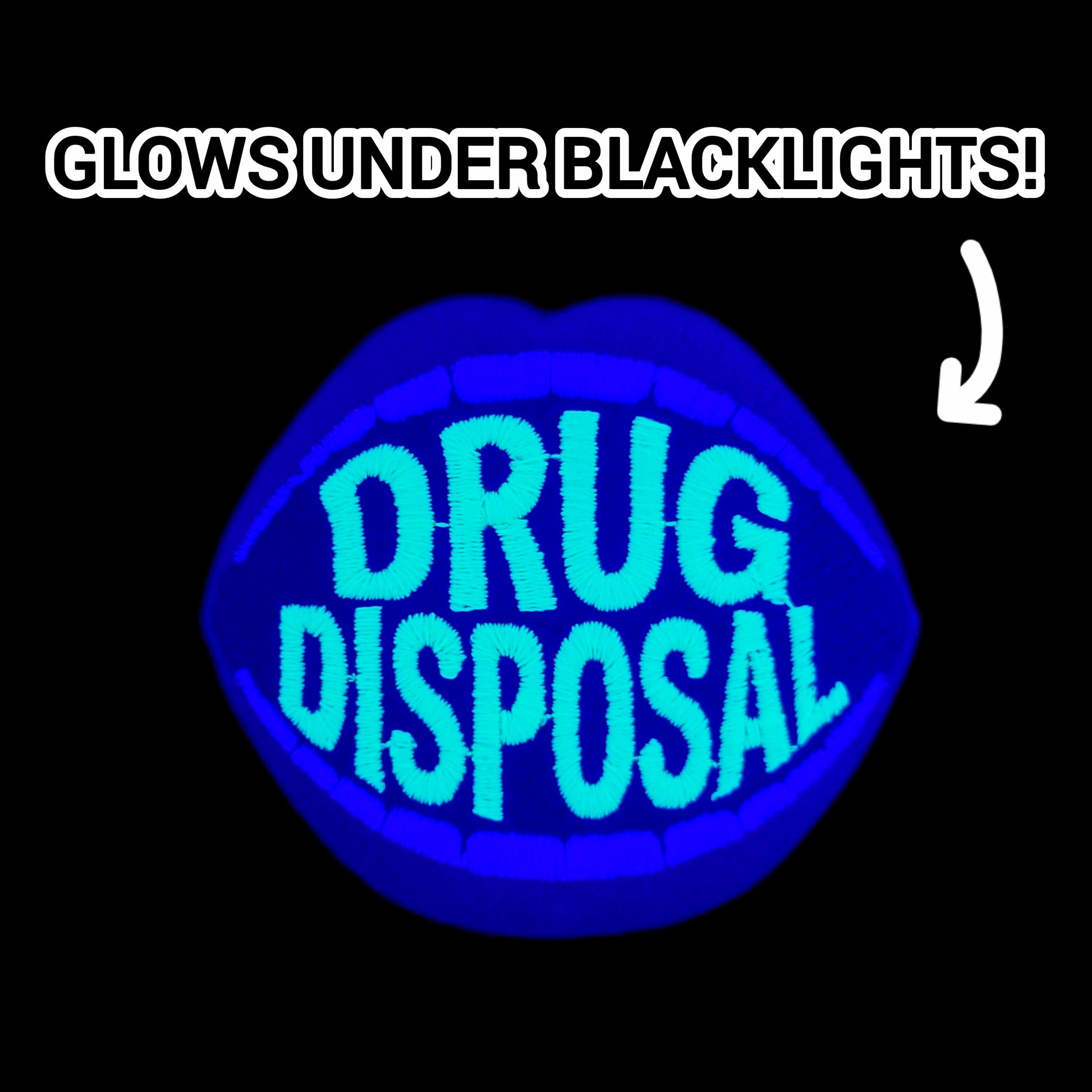 Patch of a mouth with red lips and glowing text 'Drug Disposal' on a black background, demonstrating blacklight reactivity.