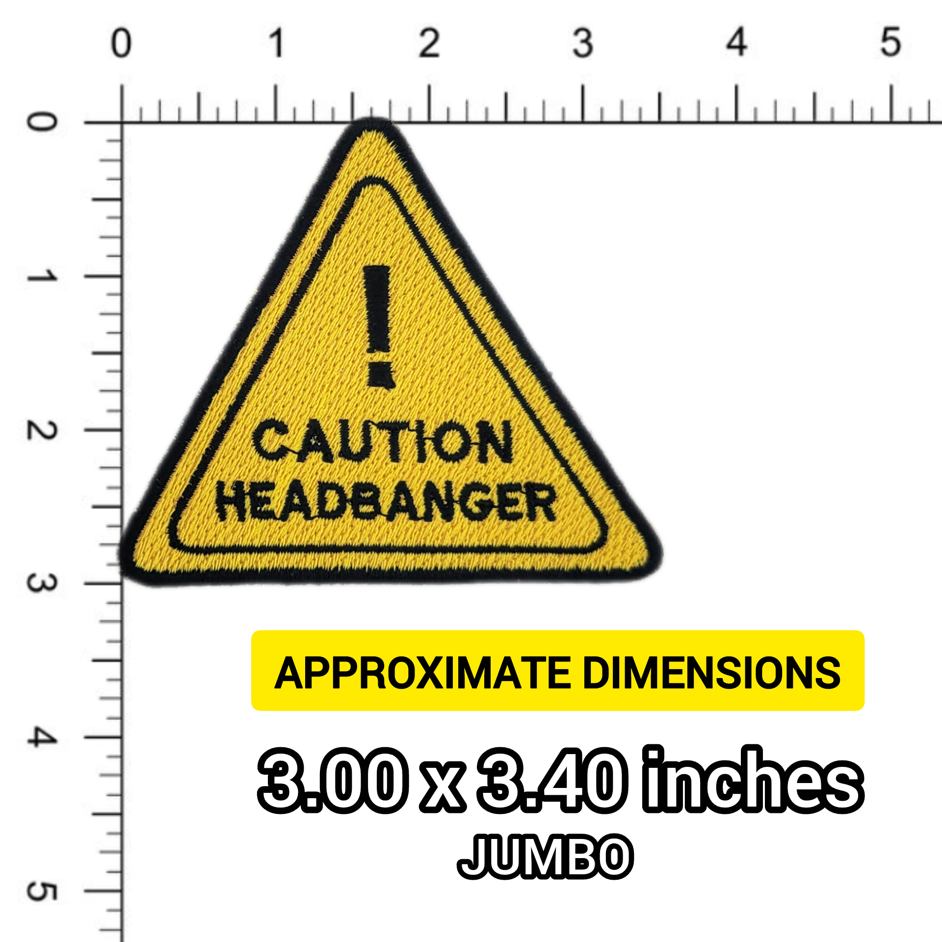 Yellow triangle warning patch with 'Caution Headbanger' text on a ruler for scale.