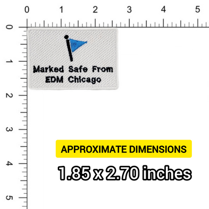 Textile label with 'Marked Safe From EDM Chicago' on a white background with measurement scale.