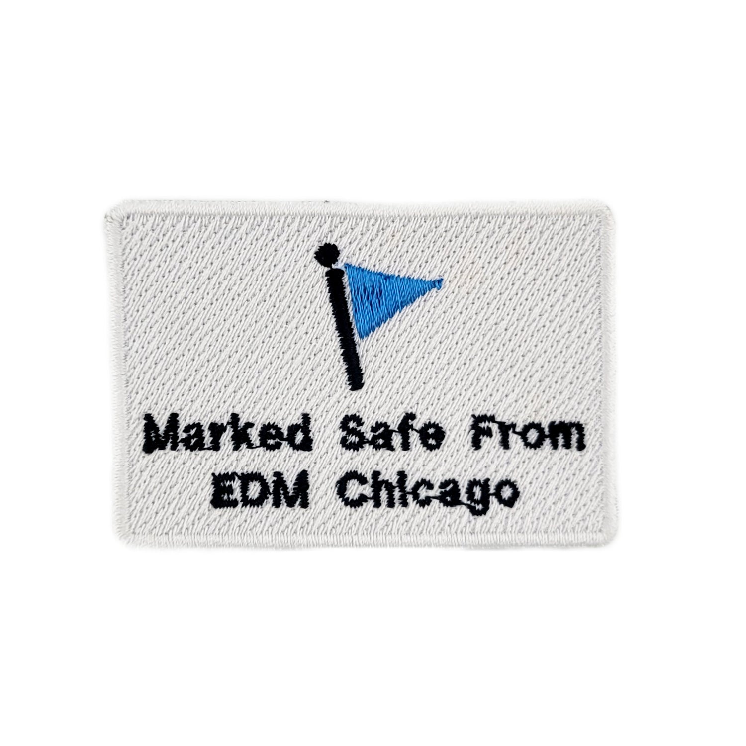Embroidered patch with blue flag and text 'Marked Safe From EDM Chicago' on a white background
