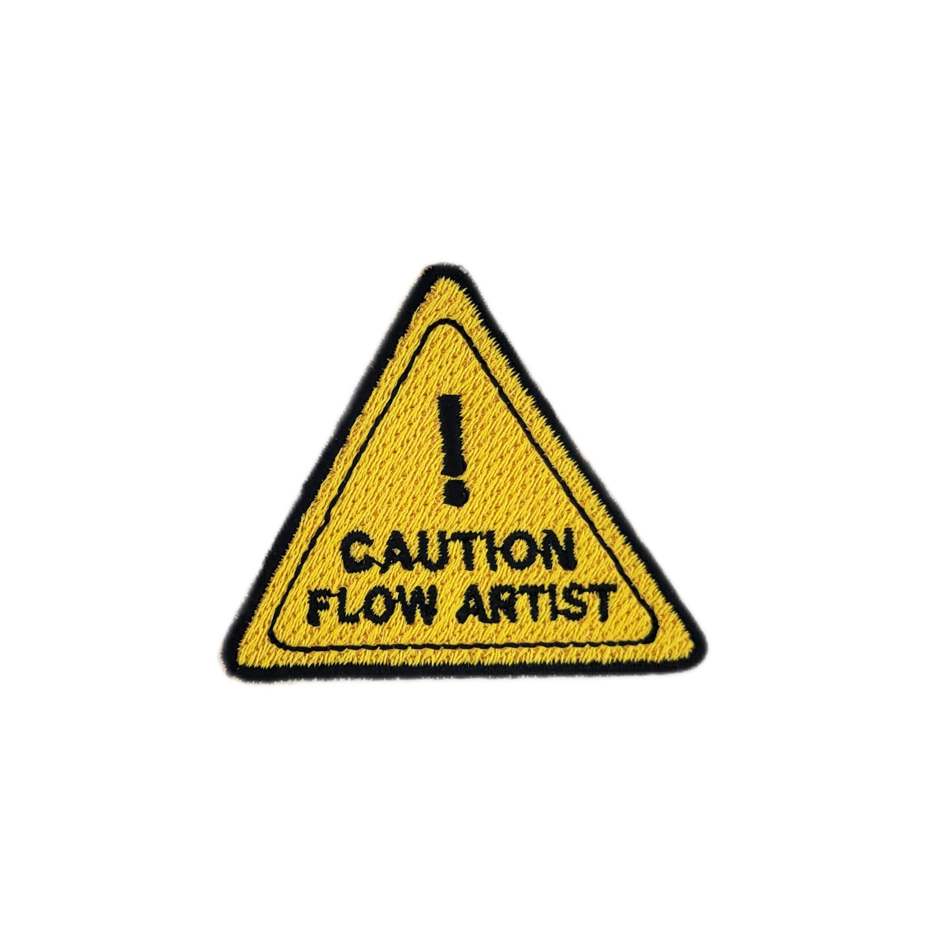 Triangular warning sign with 'Caution Flow Artist' text on a white background