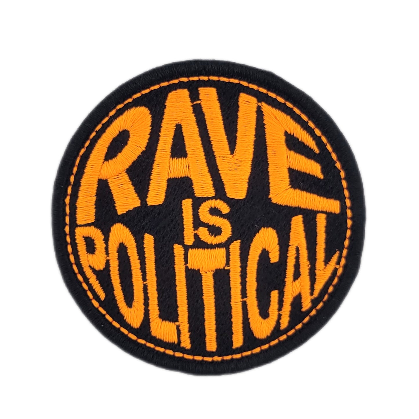 Round patch with 'RAVE IS POLITICAL' text in orange on a black background