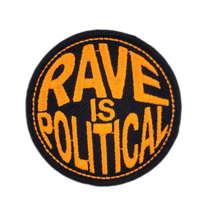 Round patch with 'RAVE IS POLITICAL' text in orange on a black background