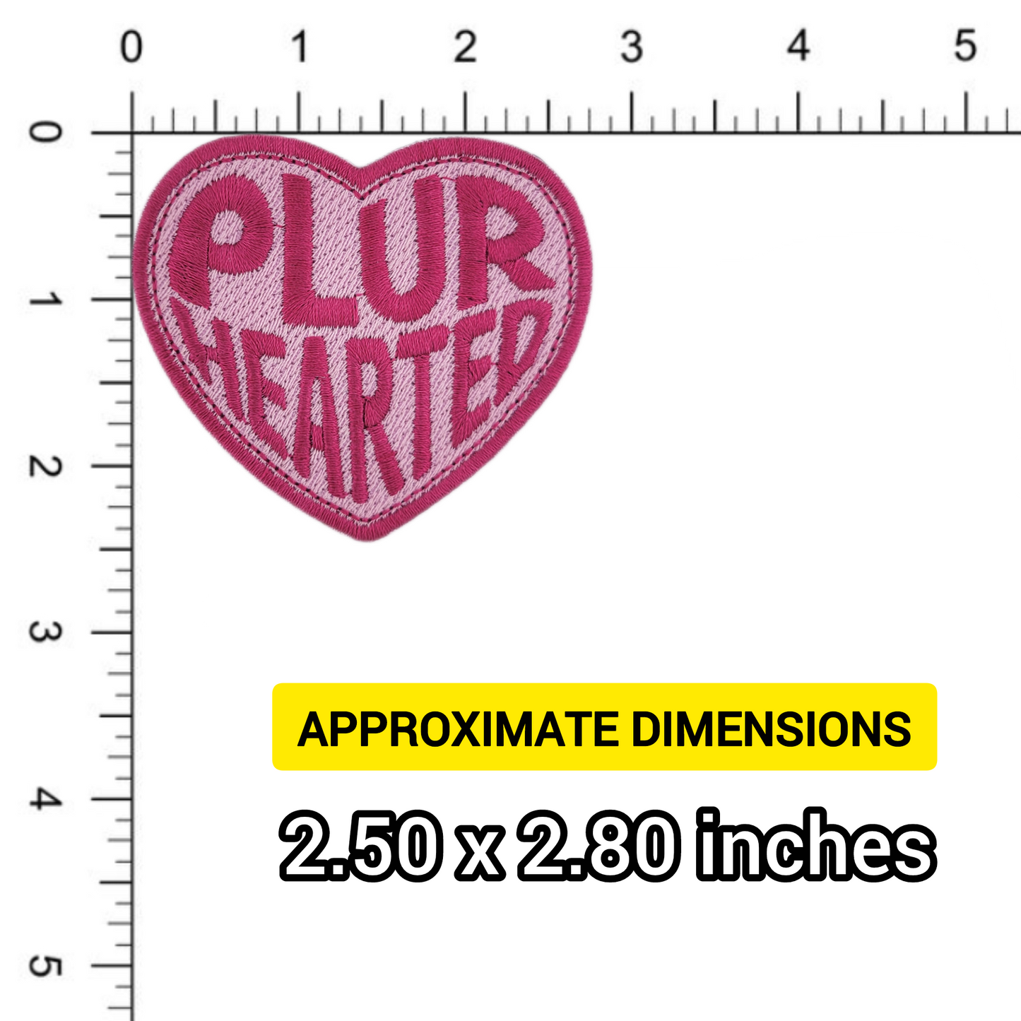 Heart-shaped patch with 'PLUR HEARTED' text on a ruler for size reference