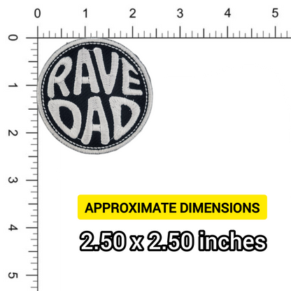 Round patch with 'RAVE DAD' text on a white background, measured against a ruler.