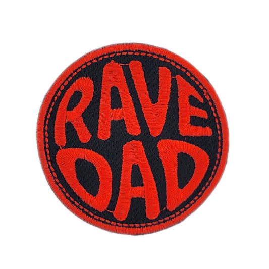 Round patch with 'RAVE DAD' text in red and black on a white background