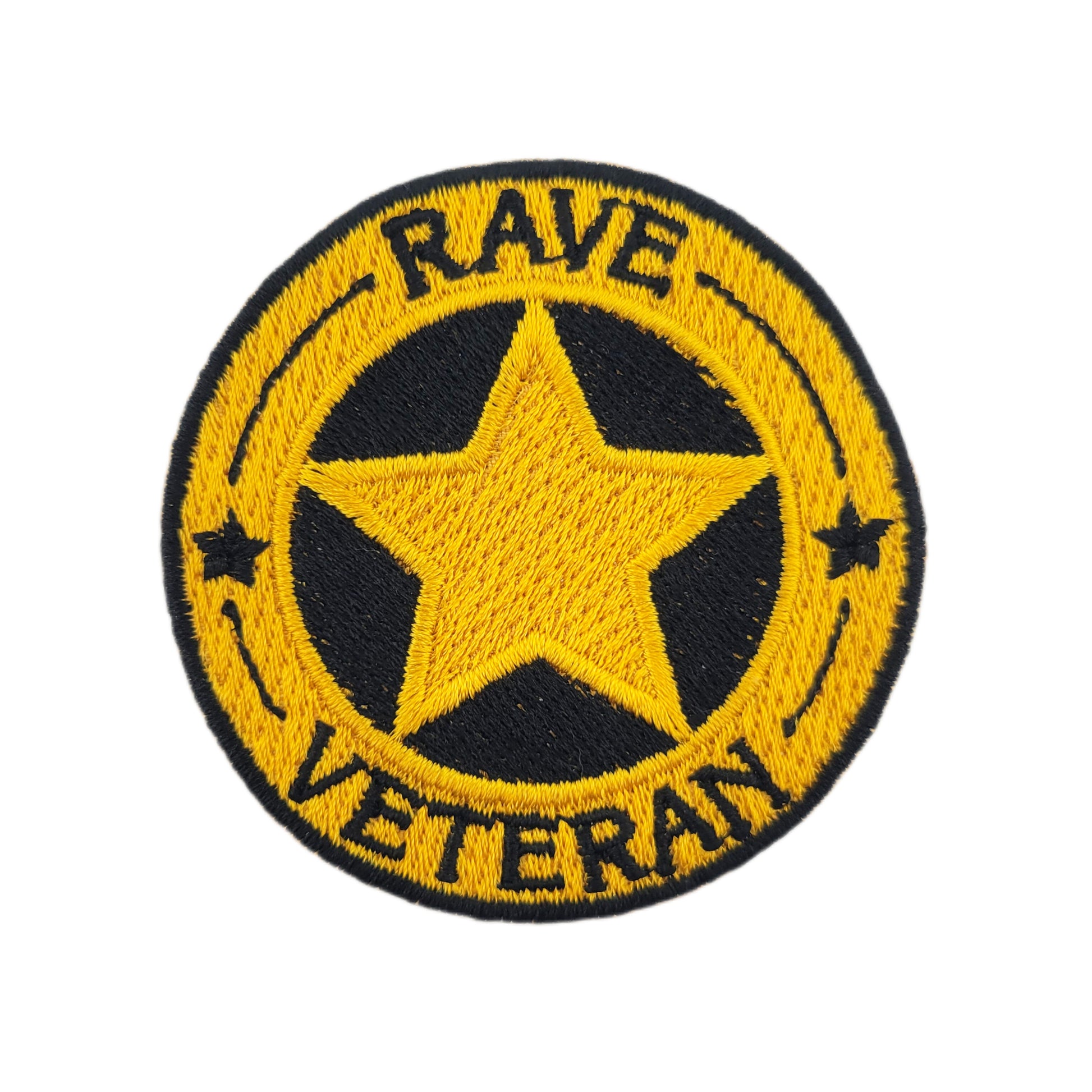 Patch with yellow star and text 'RAVE VETERAN' on a white background