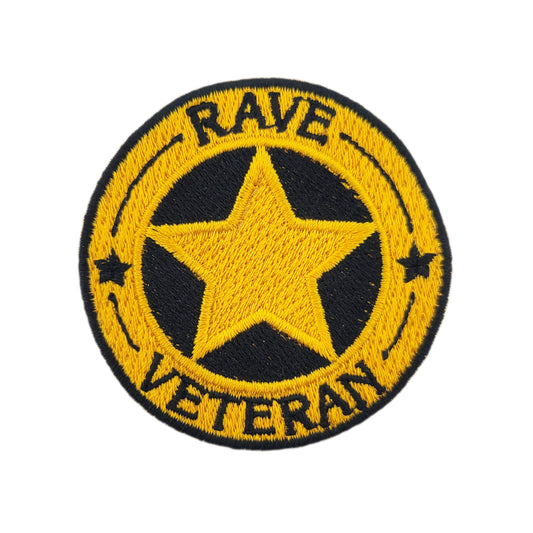 Patch with yellow star and text 'RAVE VETERAN' on a white background