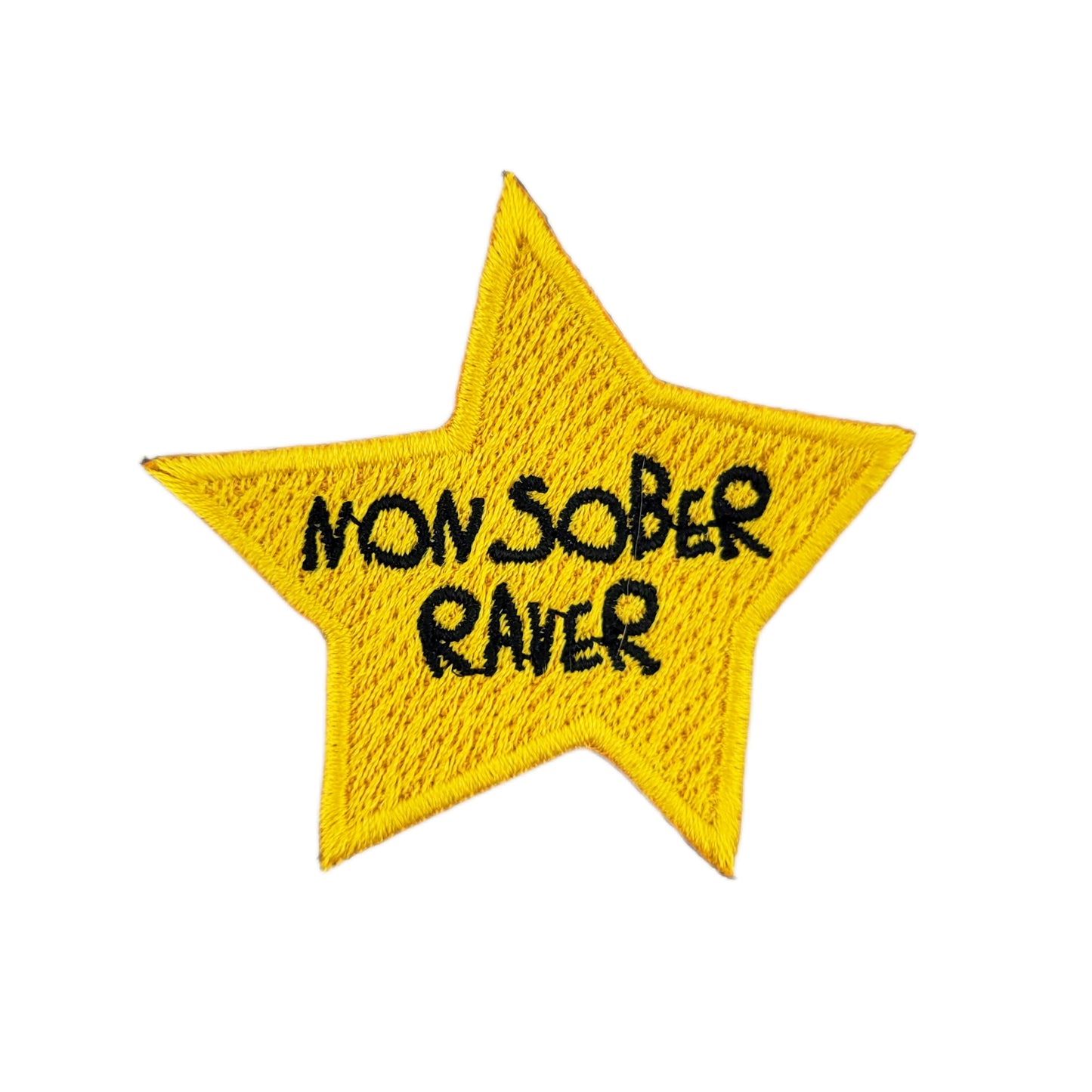 Yellow star patch with 'Non Sober Raver' text on a white background