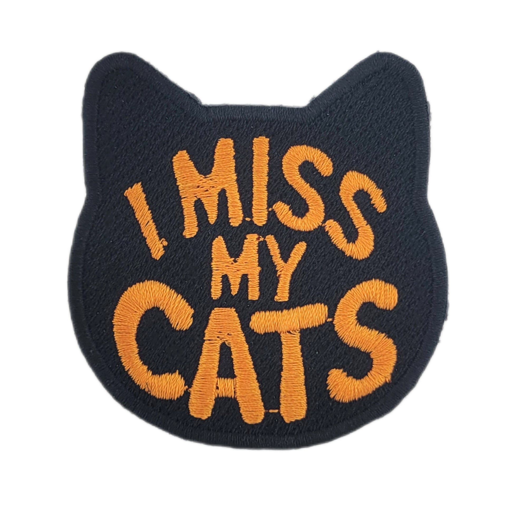 Embroidered patch with 'I MISS MY CATS' in orange text on a black background