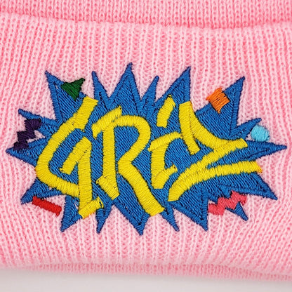 Pink beanie with colorful 'GRIZ' embroidery, close-up
