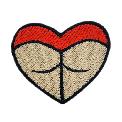Heart-shaped rave booty embroidered patch, with red bottoms and a light skin tone.
