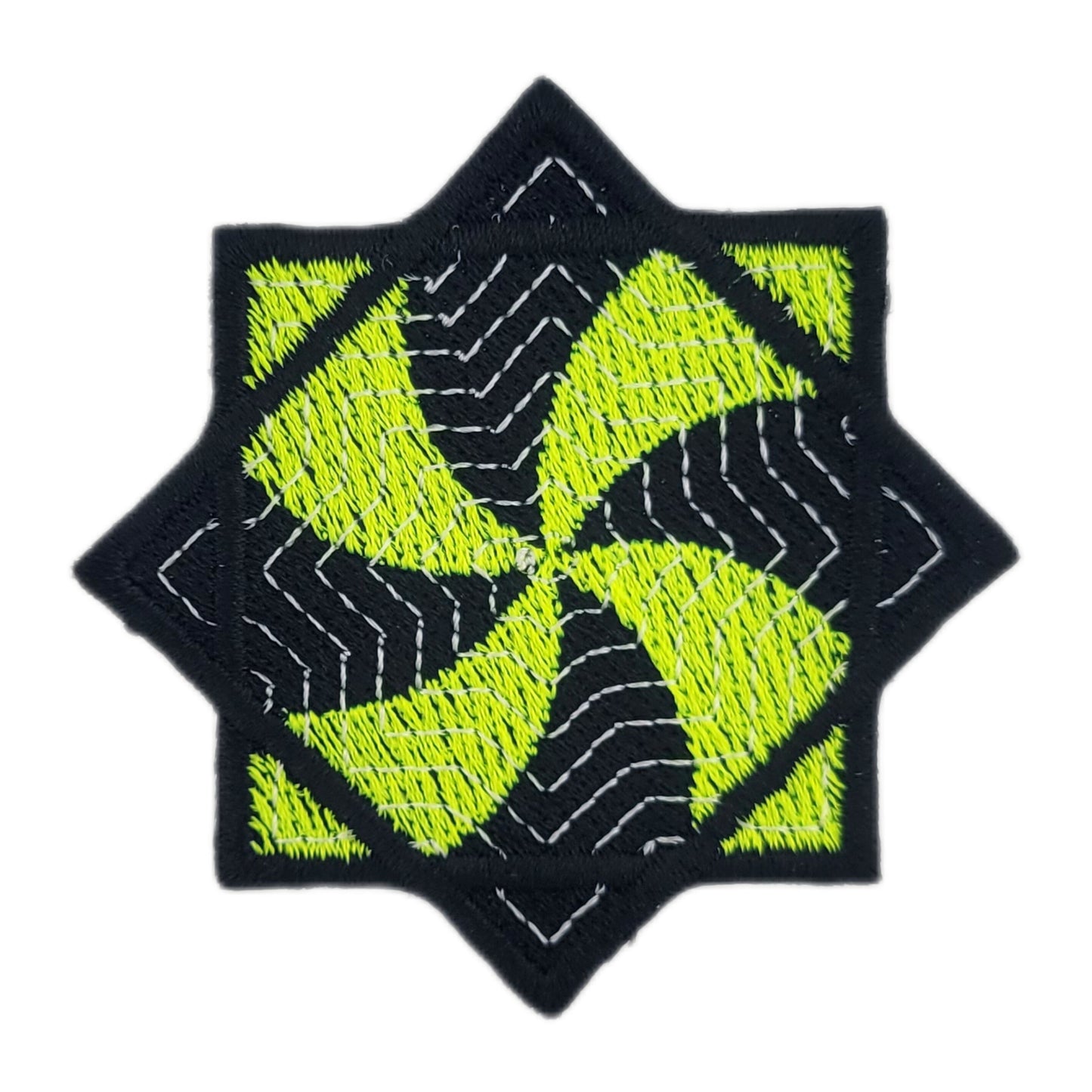 Embroidered patch of a yellow and black flow star on a white background