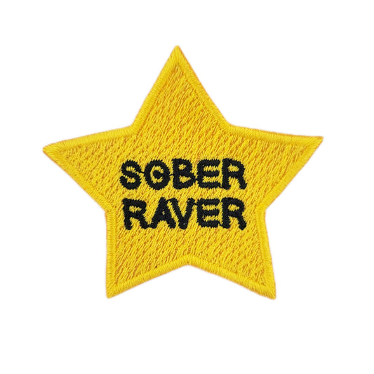 Yellow star patch with 'SOBER RAVER' text on a white background