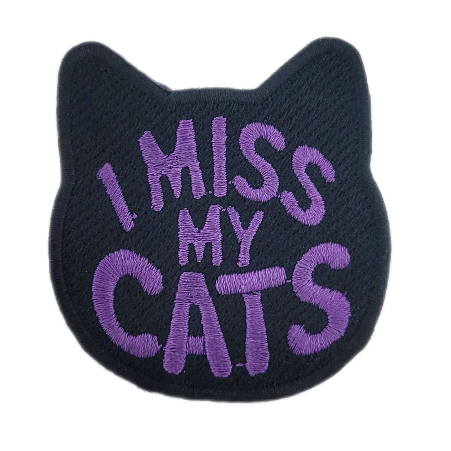 Black cat-shaped patch with 'I Miss My Cats' text in purple on a white background