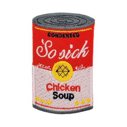 Embroidered patch of novelty can of 'Chicken Soup' with humorous text ' So Sick, Chicken Soup' on a white background