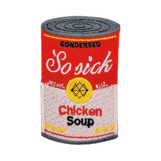 Embroidered patch of novelty can of 'Chicken Soup' with humorous text ' So Sick, Chicken Soup' on a white background