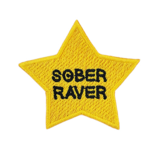 Yellow star patch with 'SOBER RAVER' text on a white background