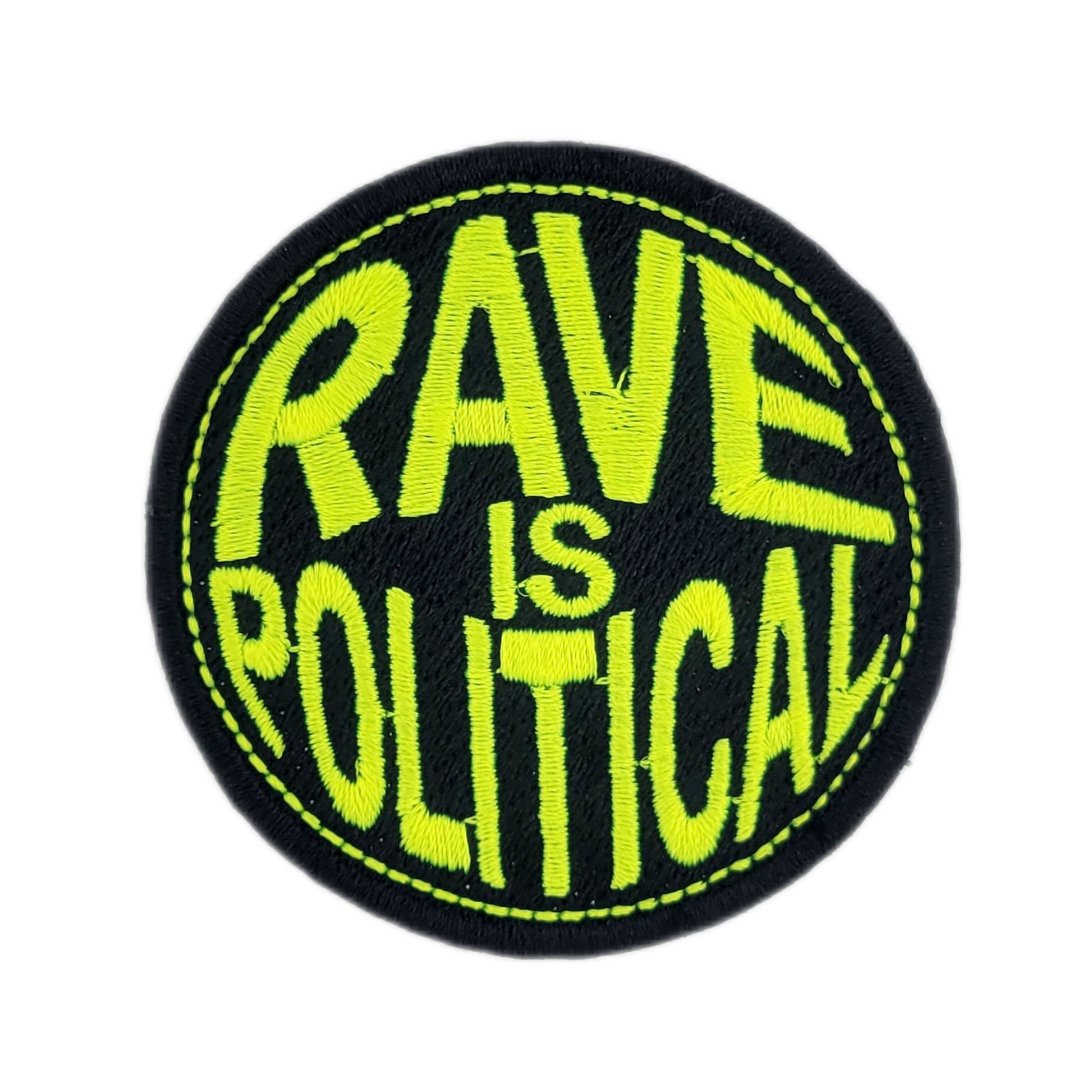 Round patch with 'RAVE IS POLITICAL' text in yellow on a black background
